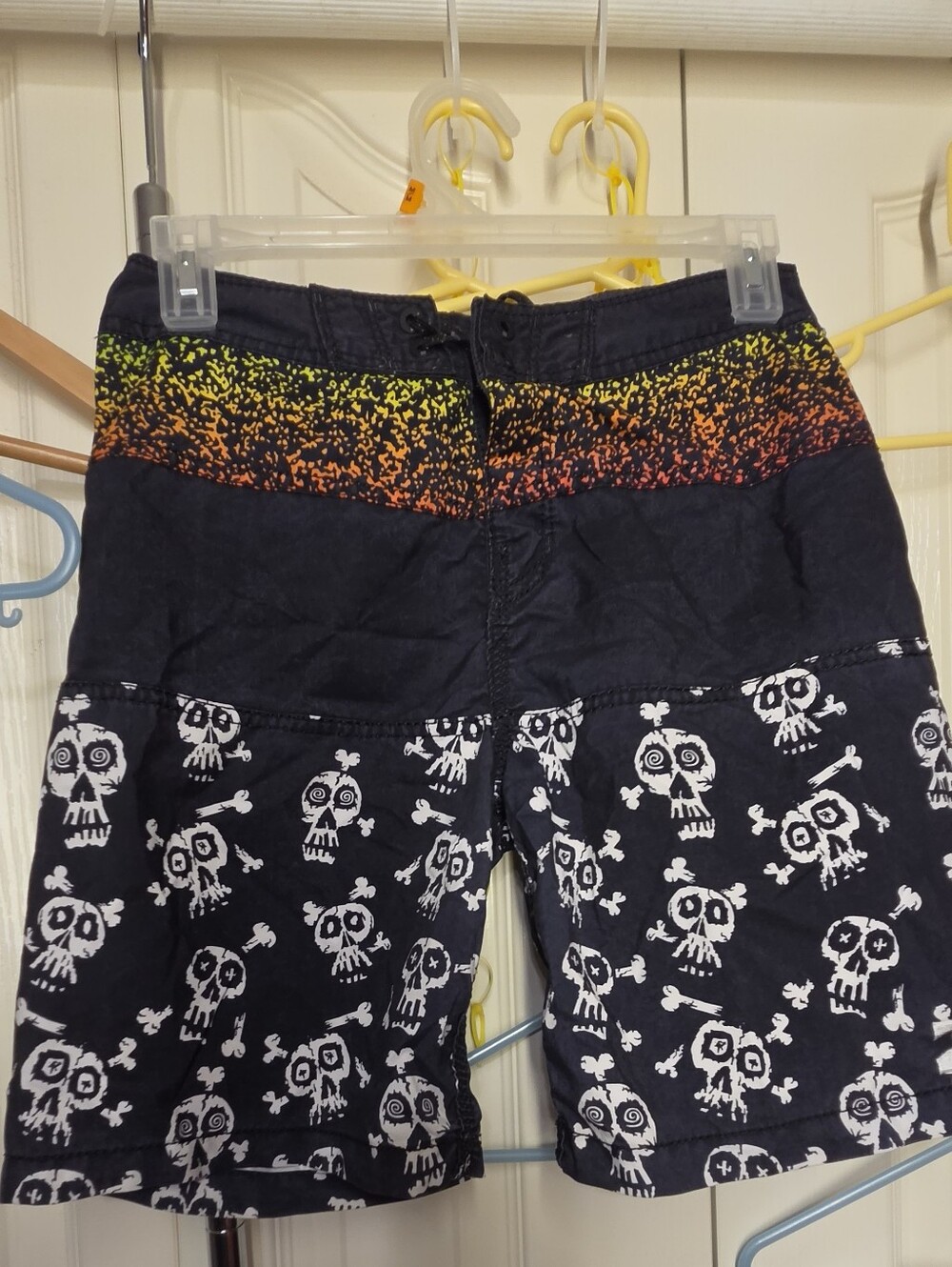 Billabong Boys Black Swim Trunks with White Skull Print and Neon Waistband